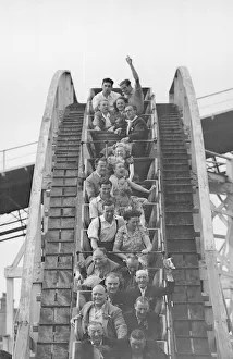 Excited Prints: Day trippers from the East End of London seen here enjoying themselves on the big dipper