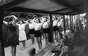 On one day a week, mothers collecting their children at the Dorking wartime nursery