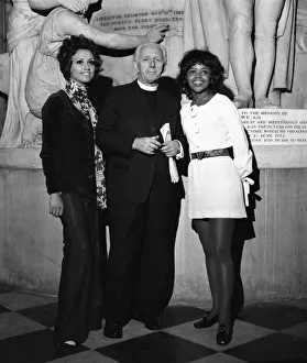 Dean of St Pauls Cathedral Reverend Martin Sullivan with Go Go dancer Sandie