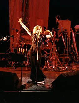 Debbie Harry Singer and leader of pop group Blondie performing on stage