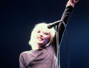 Debbie Harry on stage in 1980 singing performing concert microphone