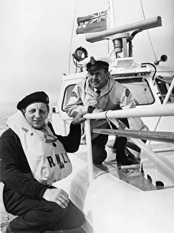 Deck hand Eric Fry (left) and Mechanical Second Coxswain Fred Mullay at work on board