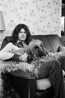 Deep Purple guitarist Glenn Hughes relaxes with his pet Afghan hound Khama after