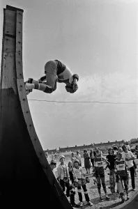 Skateboard Prints: Demonstration of skateboarding skills on the half pipe at the Cambridge Skatepark