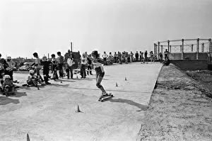 Demonstration of skateboarding skills on the slalom at the Cambridge Skatepark