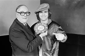 01323 Prints: Denis Howell Labour Minister of State for Sport with pop star Elton John