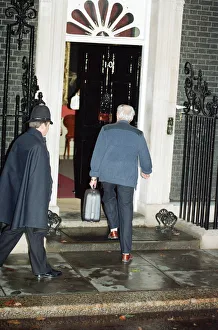 Tory Prints: Denis Thatcher carries a suitcase into 10 Downing Street following the Prime Minister