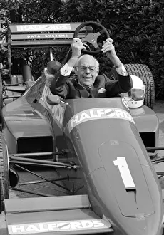 Racing Car Prints: Denis Thatcher pictured in a Halfords racing car - 19 / 07 / 1988