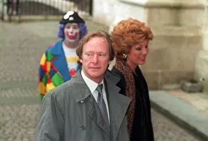 00134 Prints: Denis Waterman Actor with wife Rula Lenska at Les Dawsons Memorial
