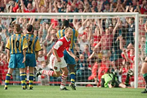 Highbury Prints: Dennis Bergkamp celebrates his second goal for his new club Arsenal