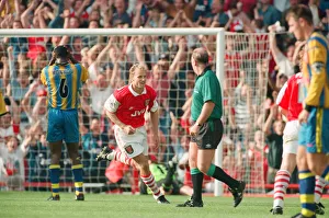 Dennis Bergkamp celebrates his second goal for his new club Arsenal