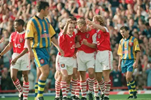 Dennis Bergkamp celebrates his second goal for his new club Arsenal