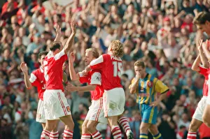 Dennis Bergkamp celebrates his second goal for his new club Arsenal