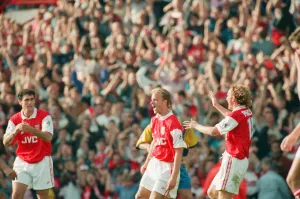 Dennis Bergkamp celebrates his second goal for his new club Arsenal