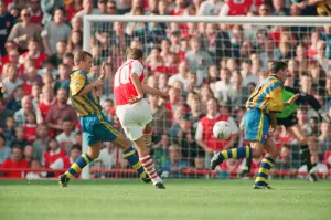 Dennis Bergkamp scores his second goal for his new club Arsenal