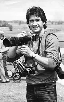 Captain Prints: Dennis Mortimer, Aston Villa captain when they won the European Cup. Holding a camera