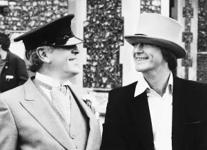Dennis Waterman actor and George Cole actor relax during a break in filming episode