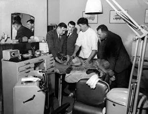 Police Prints: Dental surgeon William Dobbs and members of the police dog section