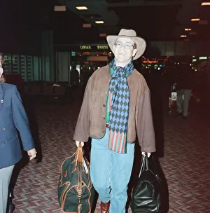 The departure of Elton John to New York. London Heathrow Airport. 28th November 1991