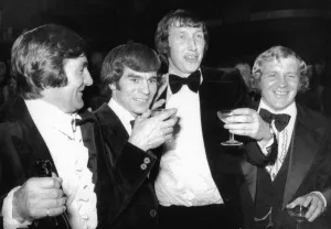Derby County assistant manager Des Anderson with players Henry Newton