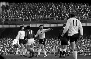 00034 Prints: Derby v. Nottingham Forest. Dave Mackay not seeing eye to eye with the ref