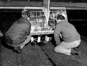 Inventions Prints: Derek Gray and Barry Stacy attempt to get a man propelled plane off the ground