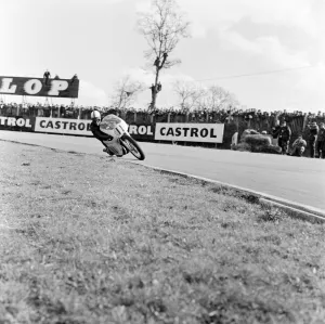 Sign Prints: Derek Minter, No. 11, wins the 250-1000cc Class on a 500cc Gilera