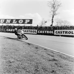 Derek Minter, No. 11, wins the 250-1000cc Class on a 500cc Gilera