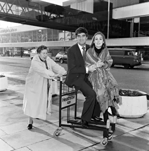 Derek Nimmo with Peggy Mount (left) and Paula Wilcox leaving Heathrow Airport for