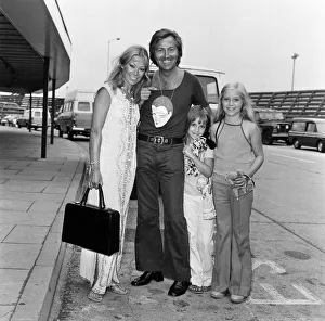 Daughters Prints: Des O Connor arrives at Heathrow Airport with his wife Gillian