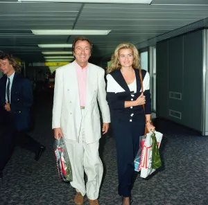 Des O Connor and girlfriend Jodie Brooke Wilson and Heathrow Airport
