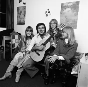 Instrument Prints: Des O Connor playing guitar at home with his daughters Tracy and Samantha