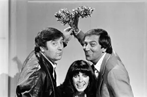 Des O Connor plays genial host to his guests Jimmy Tarbuck and Mart Caine