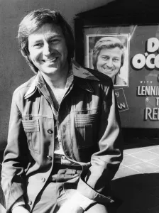 Des O Connor poses outside the Coventry Theatre where he is appearing in the