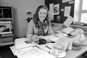 Secretary Prints: A desk covered with paper, empty coffee mugs and a calculator symbols of the busy