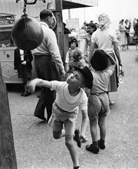 Desmond Illing, 10, felt a real tough guy in his cowboy hat so he had to have a go