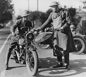 Motorbikes Prints: A despatch rider receives his instructions from an officer during a training exercise
