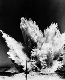 A US destroyer fires a pattern of depth charges during a search for a German U-boat