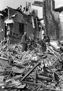 Devastation caused by a bomb. Rescue workers on the scene soon after the incident worked