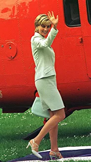 Diana, Princess of Wales preparres to board the helicopter Queen