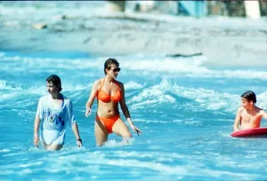 West Indies Prints: Diana, Princess of Wales in the water at Indian Castle Beach during her Nevis
