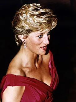 Diana, Princess of Wales, wearing a Victor Edelstein evening dress to a performance of