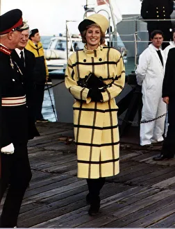 Diana, Princess of Wales, wearing a yellow and black woollen coat in blanket checks