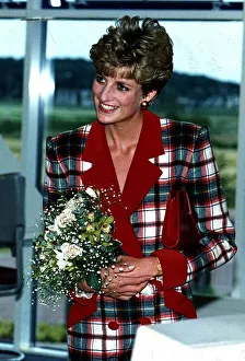 Diana, Princess of Wales wears a a Catherine Walker tartan coat dress