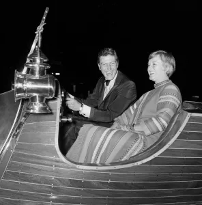 00893 Prints: Dick Van Dyke (far right) with his wife Margie at a film premier in London