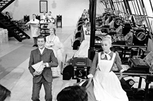 Dick Van Dyke and Sally Ann Howes (behind) filming a scene for Chitty Chitty Bang Bang