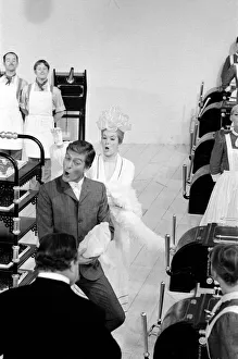 Dick Van Dyke and Sally Ann Howes (behind) filming a scene for Chitty Chitty Bang Bang