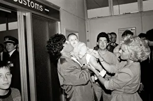 Diego Maradona - Football Player - August 1987 with Baby