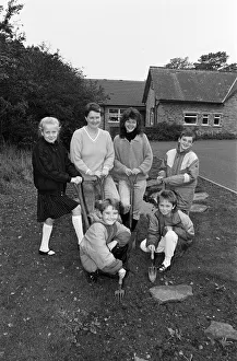 Tools Prints: Digging in... Parents and pupils at Flockton CofE First School are seen with spades