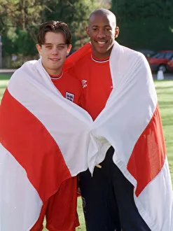 Patriotic Prints: Dion Dublin and Lee Hendrie of Aston Villa wrapped in the England flag at an England